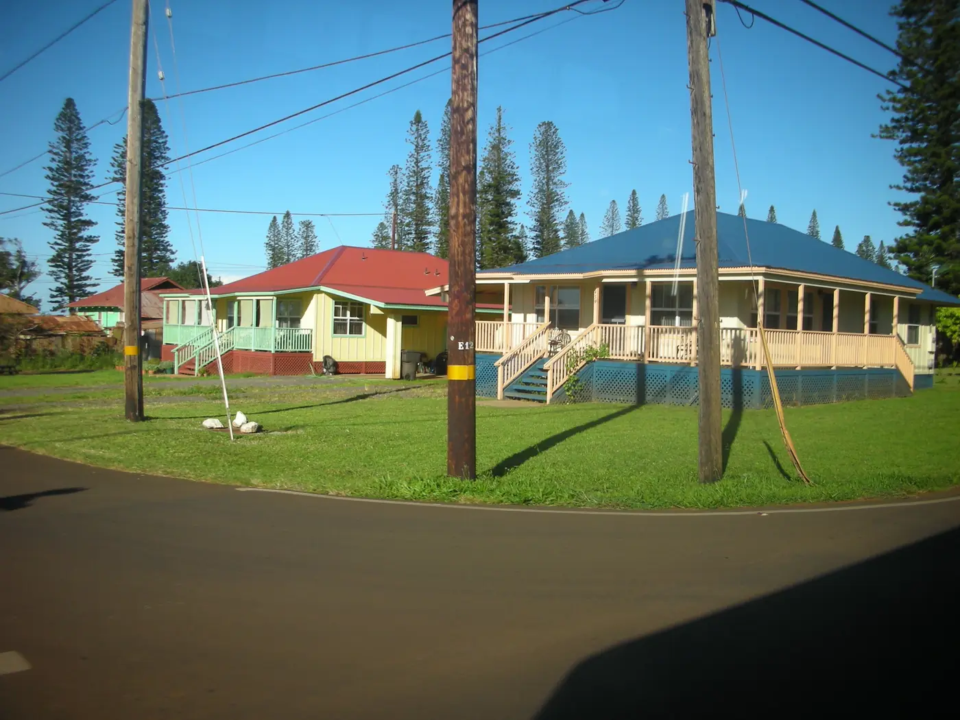 a row of plantation-style houses with front porches